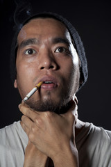 Head shot of a sick smoker
