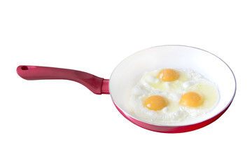 Fried eggs in a frying pan, white background