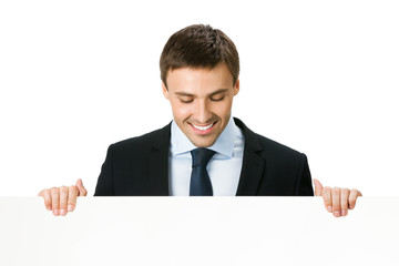 Businessman showing blank signboard, isolated