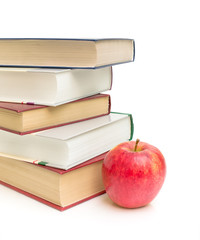 apple and books on white background