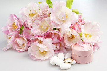 pink tulips and wedding rings
