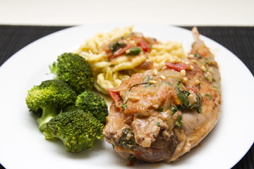 Braised rabbit with noodles and broccoli