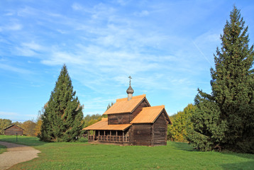 Fototapeta na wymiar aging wooden chapel in village