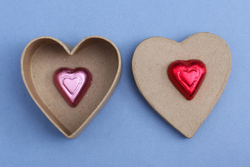Paper and chocolate hearts