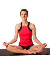 Fototapeta premium young woman doing yoga isolated on a white background.