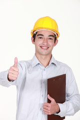 Thumbs up from a builder with a clipboard