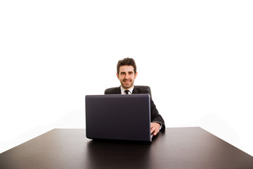 young business man working with is laptop at office desk, isolat