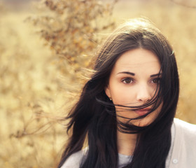 Fototapeta premium beautiful girl in a field