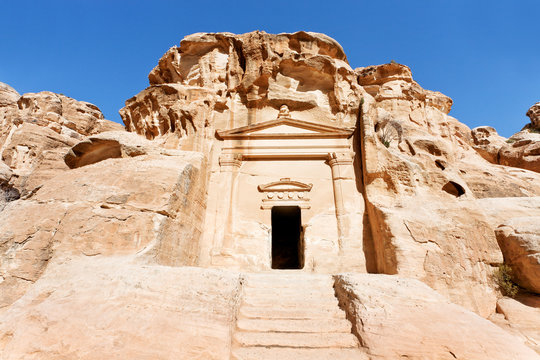 ancient tomb near the entrance in Little Petra