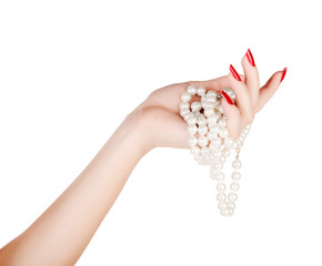 hand of woman with pearls