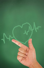 Hand pointing on heart and pulse