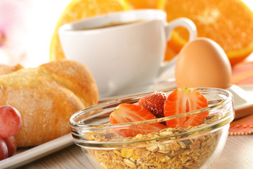 Breakfast with coffee, rolls, egg, orange juice, muesli and chee