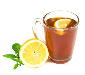 glass cup of tea with mint and lemon