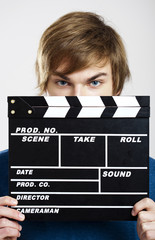 Showing a clapboard