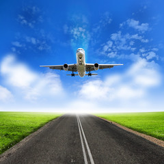 Fototapeta na wymiar Obraz z białym samolotu pasażerskiego