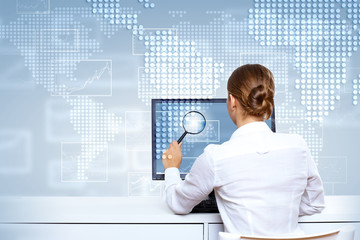 Businesswoman working with virtual digital screens