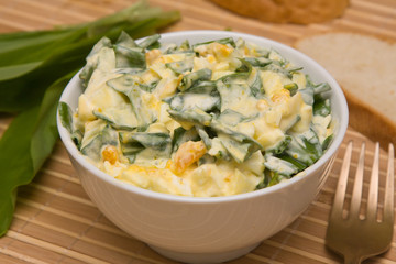 Salad of ramsons along with the egg and cucumber