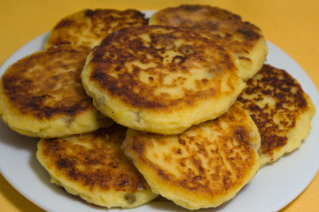 Sweet cheese pancakes on a plate