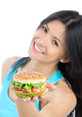 Woman with unhealthy burger in hand