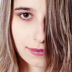 Portrait of a young woman by the sunset