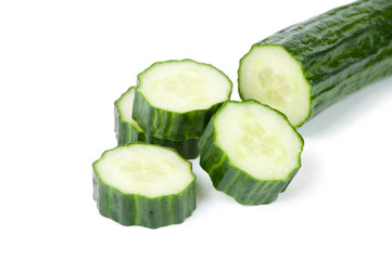 Fresh cucumber and slices isolated over white