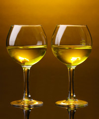 Wineglass on brown background