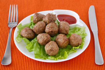 meatballs  on the plate with sauce