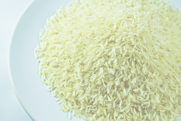 Background of the raw yellow rice grains