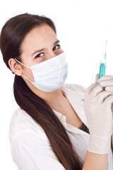 Nurse using a syringe