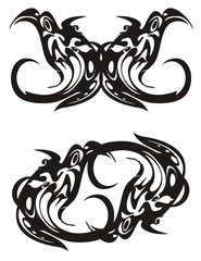 Obraz premium Tribal birds symbols in the form of a butterfly and in a circle