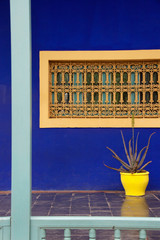 Colourful abstract in blue, yellow and turquoise of exterior building in Morocco