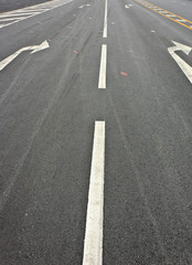 Turn direction lane mark on road.