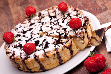 Delicious Cheesecake Decorated With Strawberries