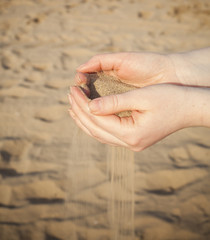 hands and sand