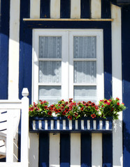 Typical decorated window in Costa Nova, Ilhavo, Portugal.