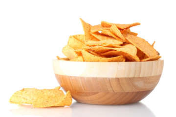tasty potato chips in wooden bowl isolated on white