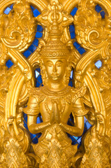 Fototapeta na wymiar Thai art style on wall, take photo from temple in Thailand