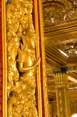 Fototapeta na wymiar Thai art style on wall, take photo from temple in Thailand