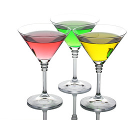 alcoholic cocktails on table isolated on white