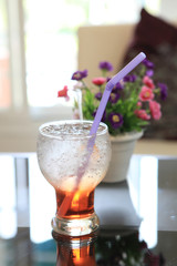 red soda cocktail with ice