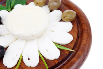 feta white cheese sliced on cut board