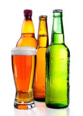 Isolated Glass Beer in plastic bottle and Two glass bottles with