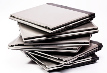 Pile of different laptops