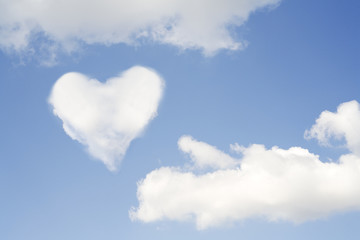 Obraz na płótnie Canvas heart shaped cloud,love symbol