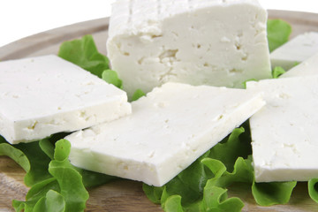 feta cheese on wooden plate