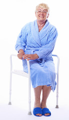 disabled elderly lady sitting on a shower seat, medical supply