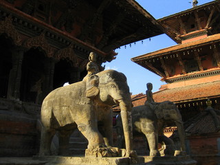 Stone elephants in a Buddhist temple courtyard