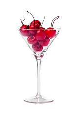 martini glass with cherry . Cherries in a glass
