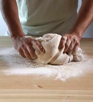Man kneading dough