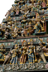 Fototapeta na wymiar Closeup of statues of Hindu Gods outside temple at Little India